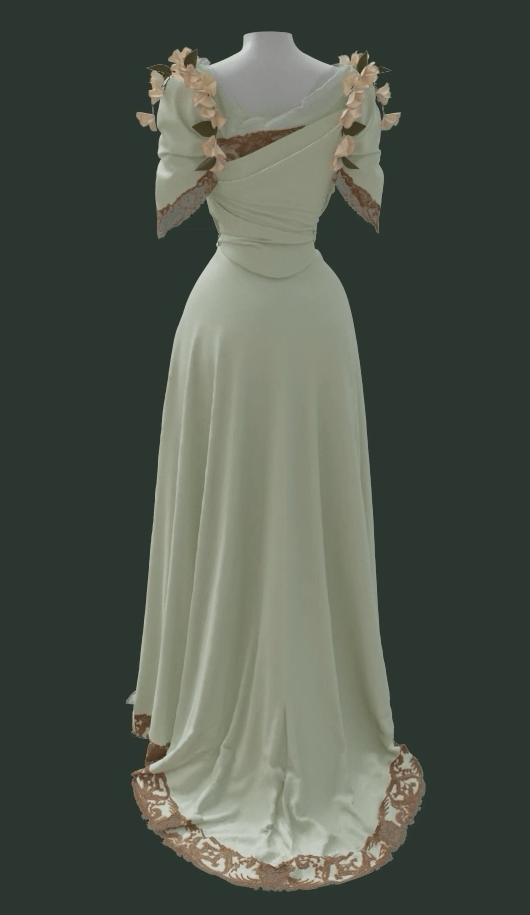 The back of a 3 dimensional rendering of the Worth Dress, showing its separate mint green skirt and bodice with surface decorations of cotton lace and morning glory flowers. The backline features silk netting and three-inch wide lace with an irregular edge. The lace is also doubled on the bodice to create a wider effect. Draped, asymmetrical silk crepe de chine on the bodice and skirt flows over the garment’s highly structured base layer.