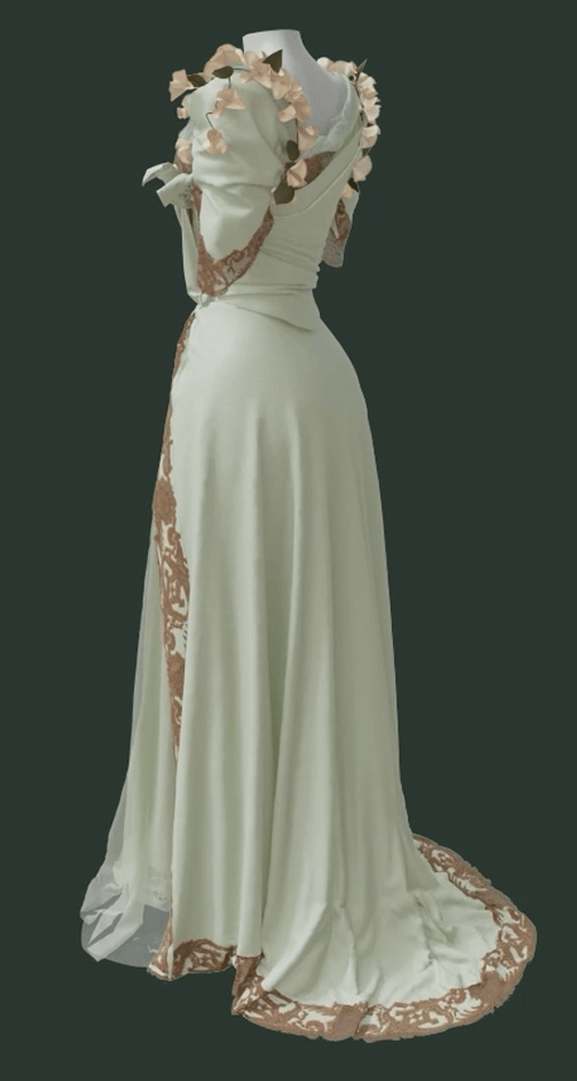 A side view of a 3 dimensional rendering of the Worth Dress, showing its separate mint green skirt and bodice with surface decorations of cotton lace and morning glory flowers.