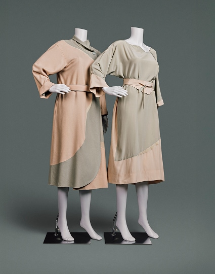 Loose-fitting silk and wool two-coloured dress and jacket. Each is designed with curved shapes where peach- and khaki-coloured fabrics meet.