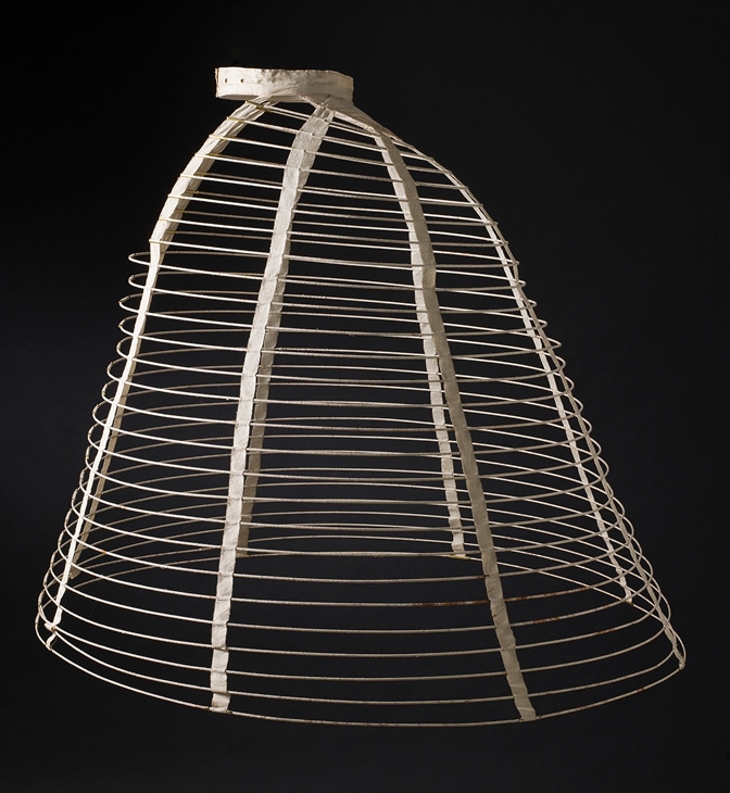 A cage crinoline made of steel and covered in cotton.
