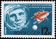 Soviet stamp depicting Cosmonaut Yuri Gagarin in his space helmet and his Vostok 1 Spacecraft.