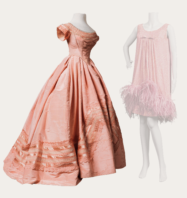 A pale pink evening dress from the 1860s thought to have been made in Italy. It has a tightly fitted bodice with a low neckline and short sleeves. The skirt is large and triangular, made of wedge-shaped panels rather than square, to create a full skirt at the hem with less bulk at the waist.